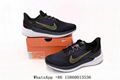 Nike Air Winflo 9 Black, Blue, and Yellow