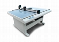 Advertising material cutting machine 10