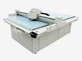 Advertising material cutting machine