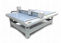 Advertising material cutting machine 18