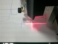 Laser light positioning for printed sample cutter 1