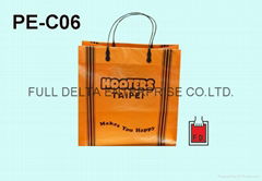 Plastic bag with Rigid Handle