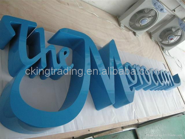 Painting fabricated steel letter sign