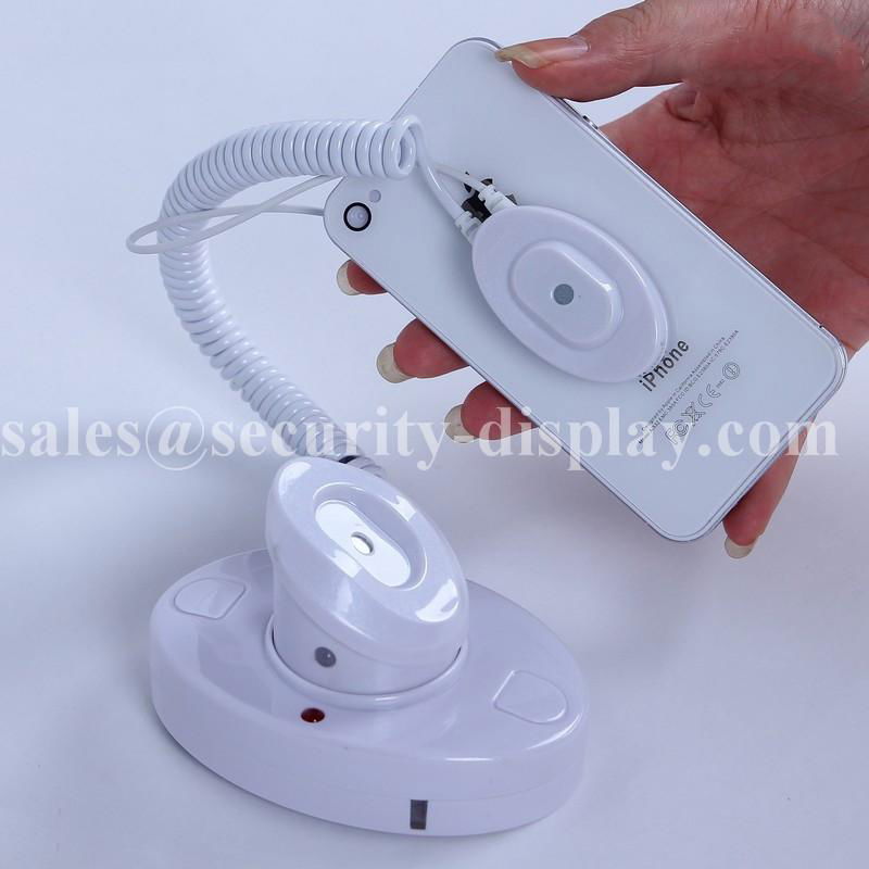 Wall mounted Alarm and Charging for mobile phone display 4