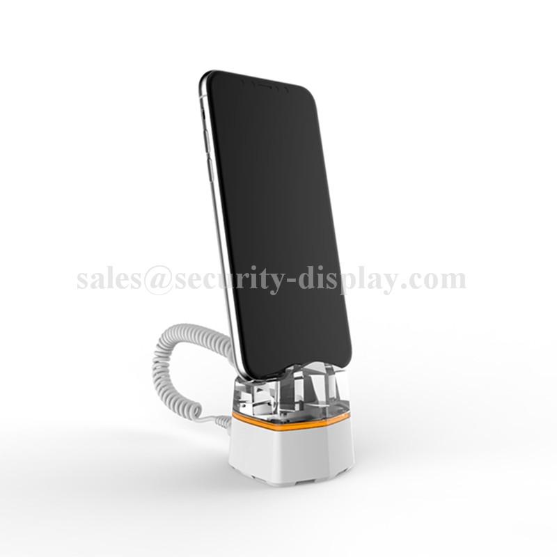 alarmed mobile phone display holder