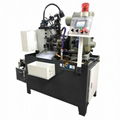 Double head automatic drilling machine for hardware shafts