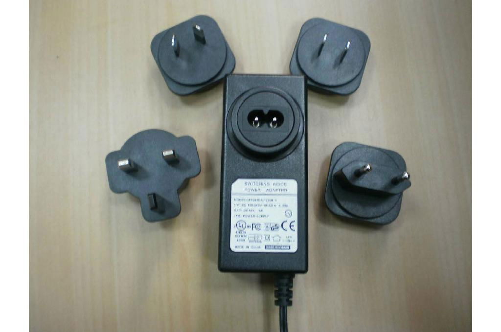 12V2A Power Adapter with interchangeable plugs for UK/EU/AU/US