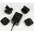 12V2A Power Adapter with interchangeable plugs for UK/EU/AU/US 2