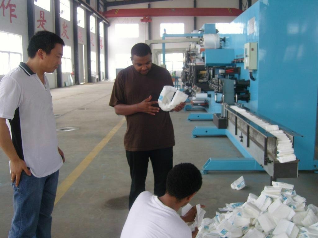 Production line for baby diaper or baby diaper machine