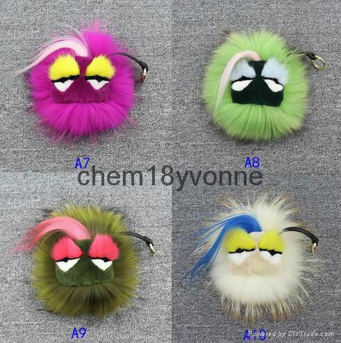 Hot sale monster face raccoon fur pom poms keychain for bag charm key chain girl 2