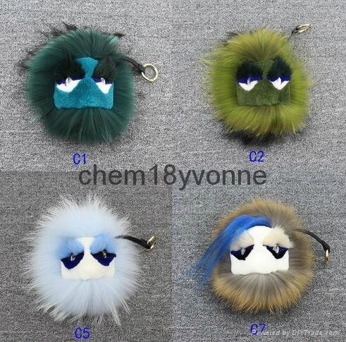 Hot sale monster face raccoon fur pom poms keychain for bag charm key chain girl 2