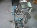 pharmaceutical metal detector with automatic rejection system