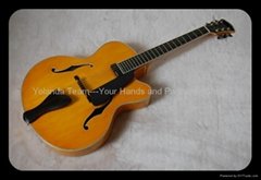 Handmade electric jazz guitar with sideport