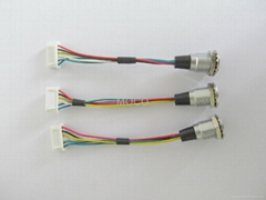 Overmolded cable assembly interconnects with MOCO straight plug connector