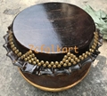 High pitch drum with golden handles, nails and fabric