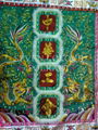 Embroidered banner with flying fish