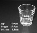1.5oz shot glass with faceting around the base