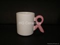 Ceramic mug with breast cancer ribbon handle