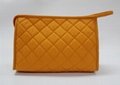 Bright yellow nylon quilted women makeup bag with snap at side for travel  2
