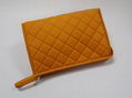 Bright yellow nylon quilted women makeup bag with snap at side for travel 