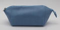 Cross pattern PU beauty lady shell shape cosmetic bag in smog blue colour  1