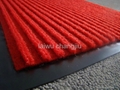 Door mat with PVC backing 