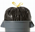 Plastic drawstring garbage bags on roll