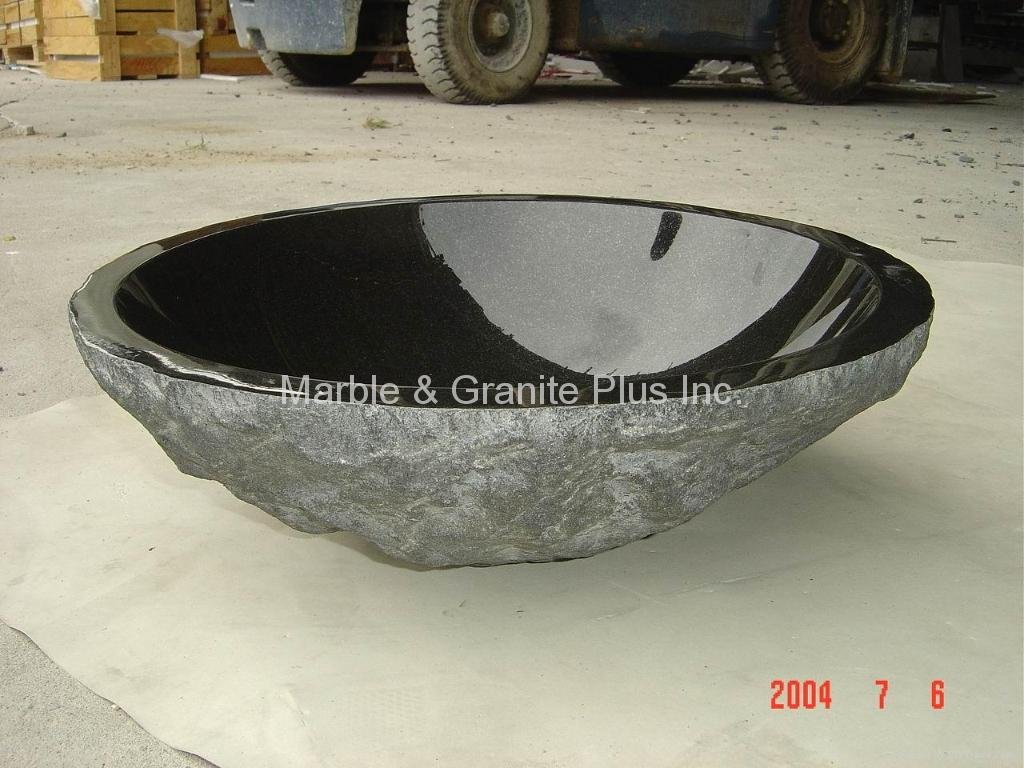 Granite bowl sink with natural cleft finish exterior