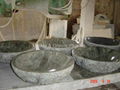 Granite bowl sink with natural cleft finish exterior