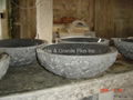 Granite bowl sink with natural cleft finish exterior