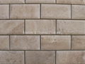 Pillow stone made out of China Beige Travertine