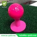 UV-Glow Golf Balls on Neon Golf Rubber Tee 