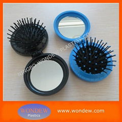 Foldable hair brush with mirror