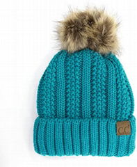 Warm soft thick cable knit beanie with faux fur pompom beanie