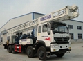 Truck mounted water well drilling rig