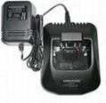 Portable radio battery charger for