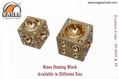 Brass doming block