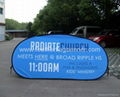 Oval pop out banner 