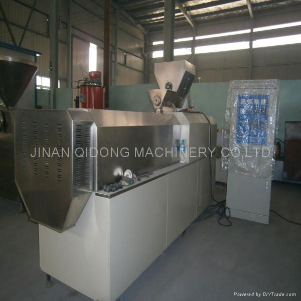 Extrusion snack processing line