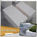 bush hammered white marble stone