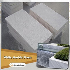 bush hammered white marble stone