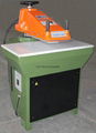 Hydraulic swing arm cutting machine