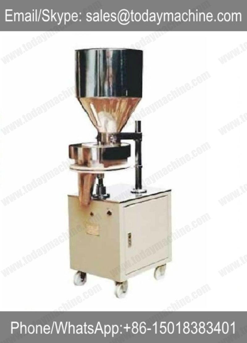 Semi automatic granule filling machine with volumetric cup