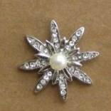 Pearl and diamond star embellishment