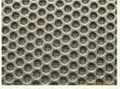 Sintered mesh with perforated metal