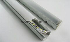Rounded LED extrusion profile for LED strips with adjustable brackets