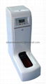 Automatic shoe cover dispenser with UV