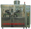 Tube filling and sealing machine