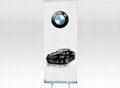 Economical roll up banner display stand