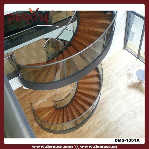 contemporary villa glass spiral staircase